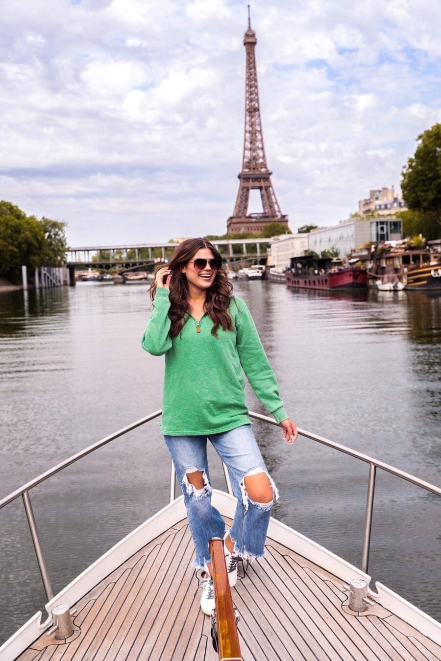 long sleeve pullover crafted from vintage wash fabric with a foldable collar, side slits, and a quarter zip in green