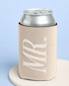 Can cooler with 'MR' text on a light blue background
