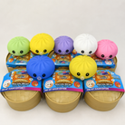 a mystery dumpling-shaped squishy fidget with assorted surprise colors, a soft sensory feel, and a bubble-blowing mouth detail