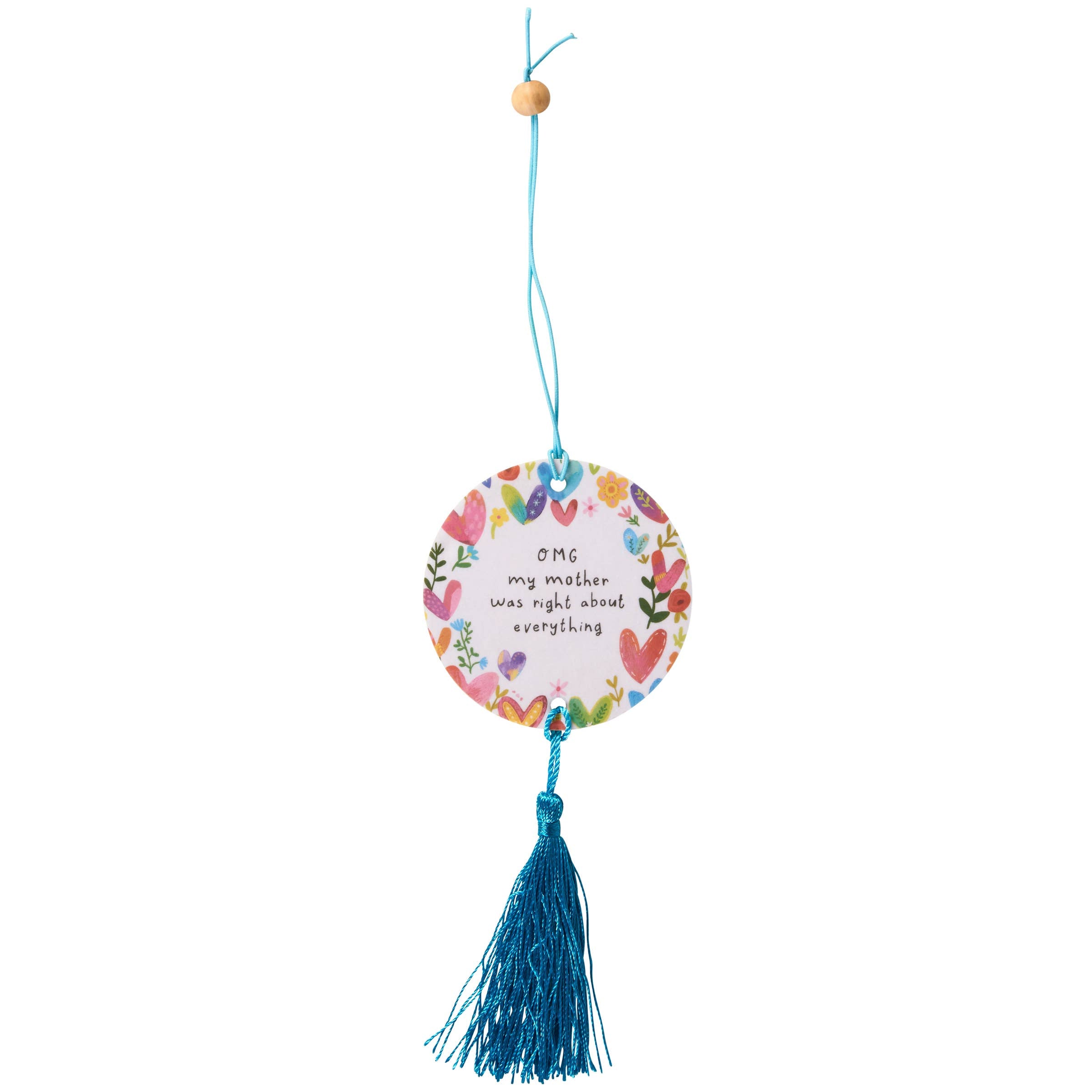 Decorative round hanging ornament with colorful design and blue tassel on a white background