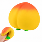 a yellow-orange ombré peach-shaped squishy toy with a soft touch texture, rounded fruit design, center groove, green leaf accent, and clear individual packaging