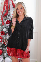 a plush velvet button-up top with subtle metallic threading, a relaxed flattering fit, three-quarter sleeves, and a soft drape for easy elegance in black