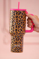 40-ounce tumbler with a hot pink and leopard print design, handle, screw-on lid, and a reusable straw