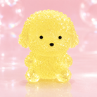 a yellow gel-filled puppy-shaped squishy with a translucent crystal-like texture, assorted colors, tiny face details, and a soft handheld design