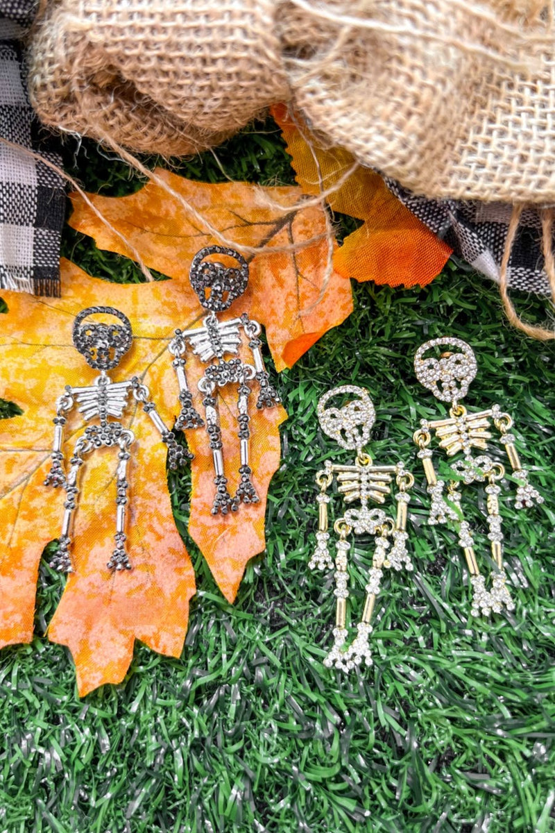 gold-plated post-back skeleton-shaped dangle earrings with rhinestone accents, skull stud tops, articulated bone design, matching barrel backs, and nickel/lead compliant construction in gold and silver
