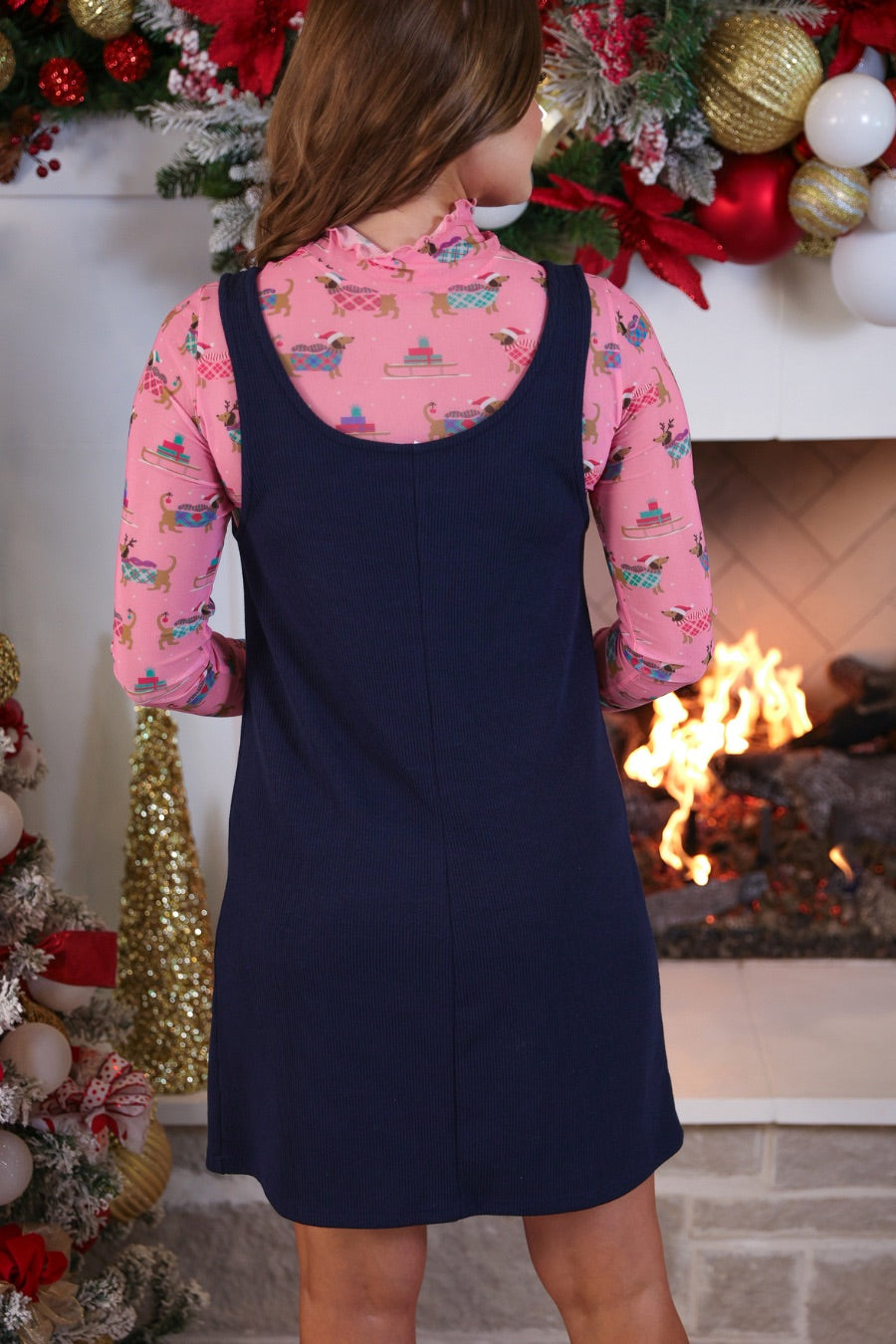 sleeveless ribbed dress with a scoop neckline, front patch pockets, and a relaxed silhouette in navy