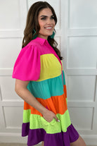 tiered multicolored dress with functional pockets, playful puff sleeves, trendy collar, & buttondown design front