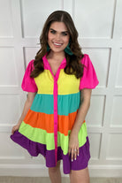 tiered multicolored dress with functional pockets, playful puff sleeves, trendy collar, & buttondown design front