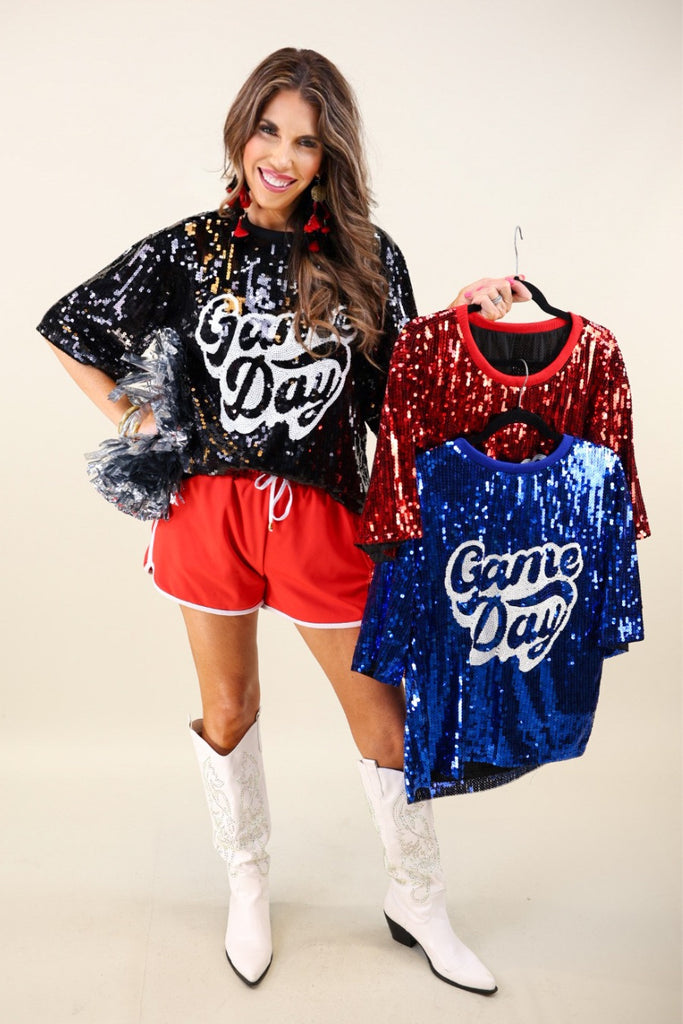 a full sequin design on a solid color with the words GAME DAY on the center front outlined in white sequins, a boxy fit, and a lined interior