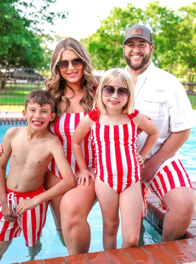 red and white striped swimsuit trunks for boys and men and one-piece for girls and women