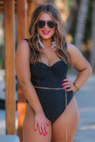 black aviator sunglasses with black tinted lenses, mini gold stud trim along the lens edge, round wireframes with matching brow bar, UV protection, and brand detail (on both the temple and the complimentary black pouch