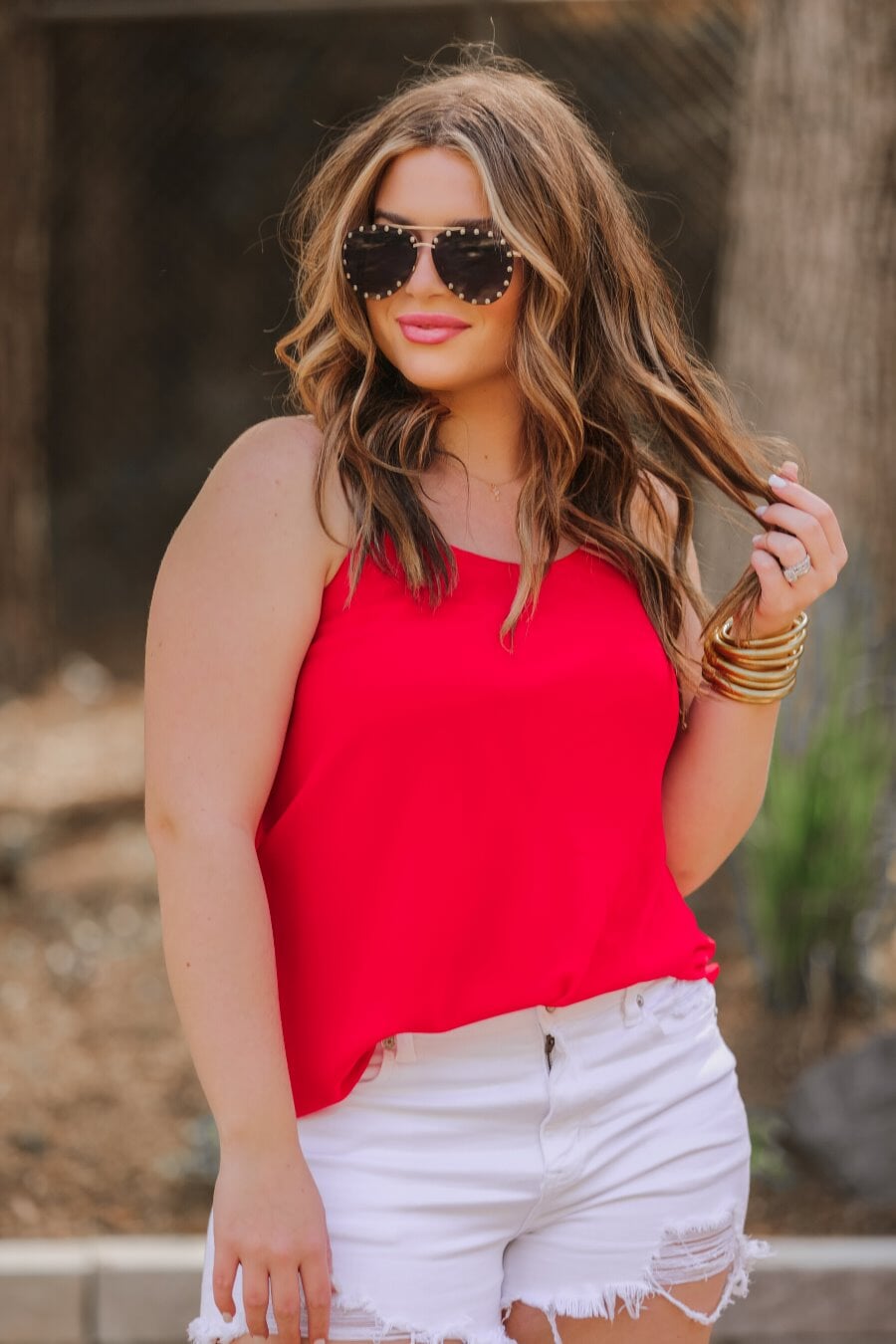 black aviator sunglasses with black tinted lenses, mini gold stud trim along the lens edge, round wireframes with matching brow bar, UV protection, and brand detail (on both the temple and the complimentary black pouch