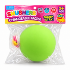 a round changeable face squishy balls with a soft matte-like surface, squeezable construction, assorted removable facial pieces, customizable expressions, vibrant color options, and individual packaging in green