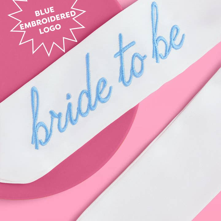 Sash with 'bride to be' text on a pink and white background