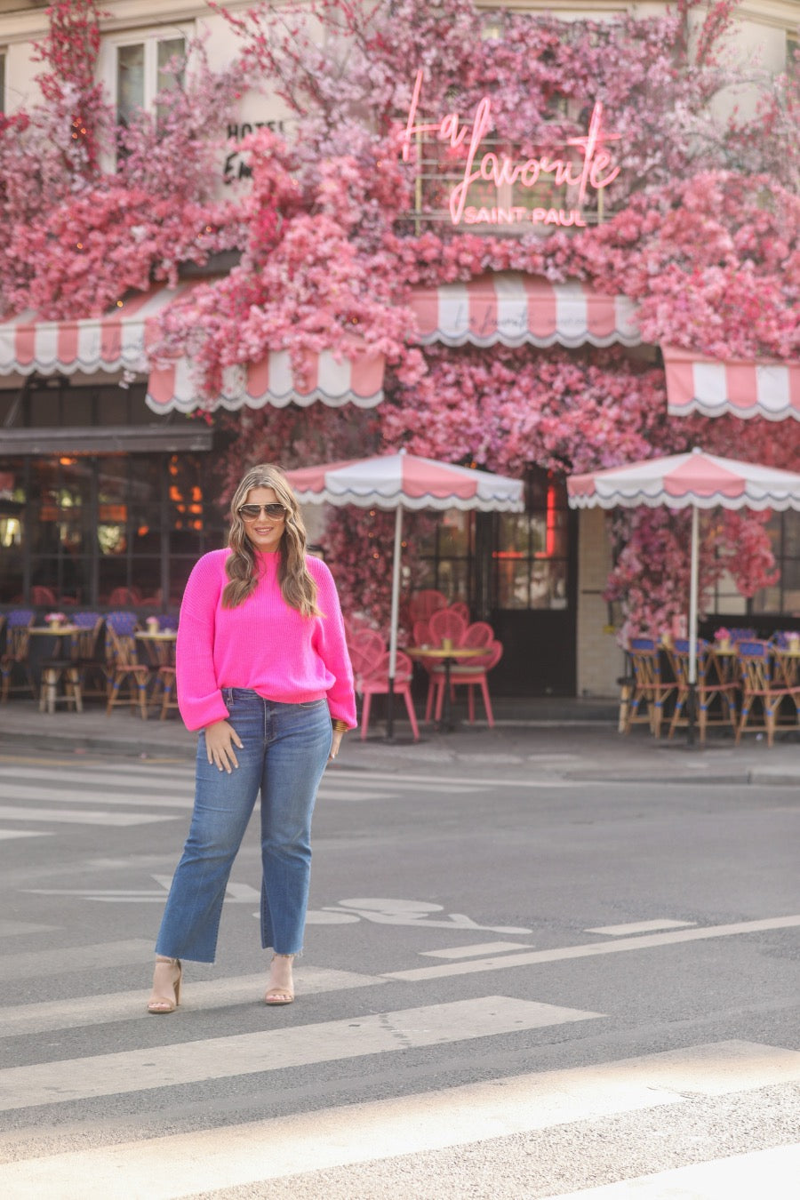 pink long sleeve sweater with a drop-shoulder for a relaxed fit, a crew neckline, and a ribbed hemline on a textured ultra-soft design fabric