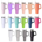 A grid of insulated travel tumblers with handles and straws, shown in multiple colors including pink, purple, peach, orange, white, light blue, mint, lime green, navy, and black, on a plain white background.