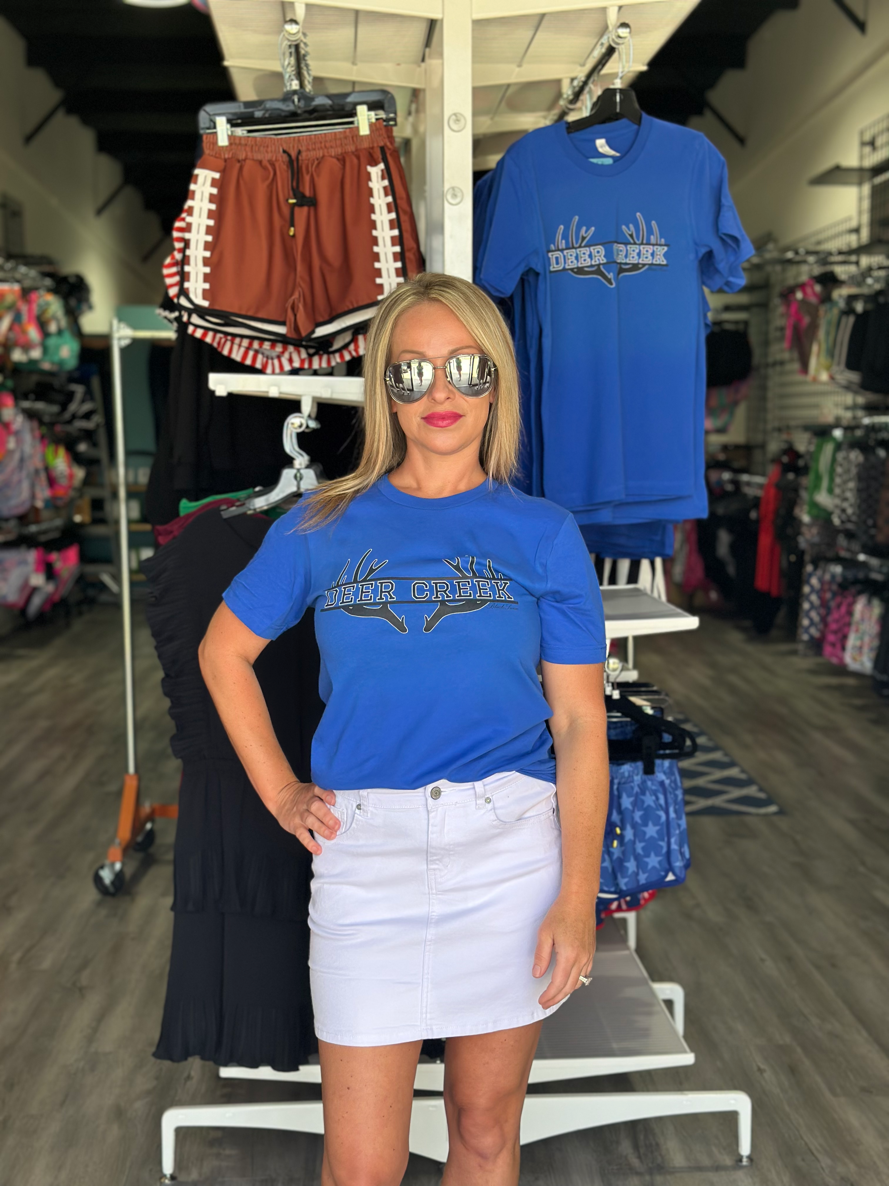 Bella+Canvas unisex tee with crisp screen-printed antlers framing 'DEER CREEK' and discreetly tagged 'BLACK SWAN' below for a signature look