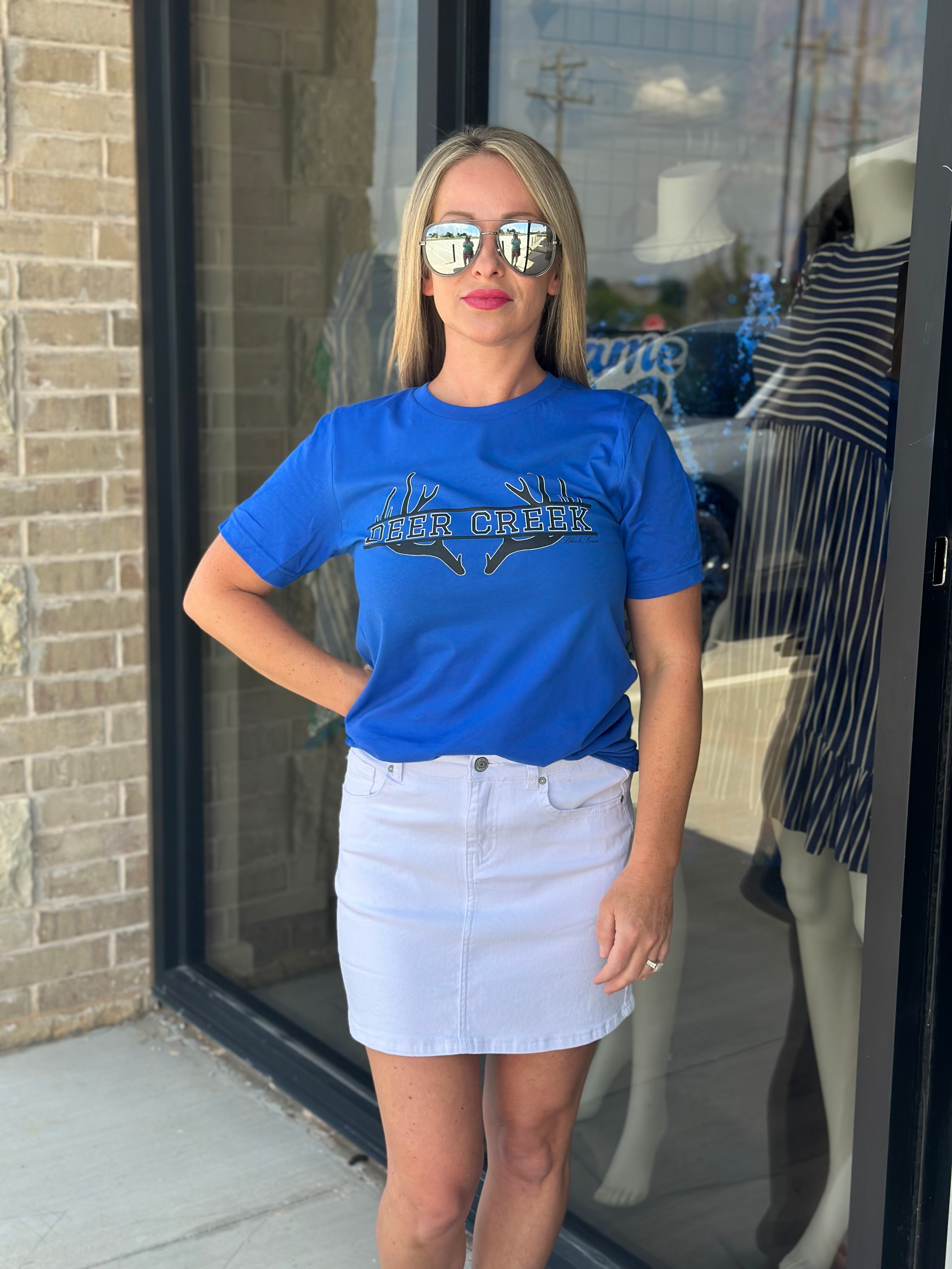 Bella+Canvas unisex tee with crisp screen-printed antlers framing 'DEER CREEK' and discreetly tagged 'BLACK SWAN' below for a signature look