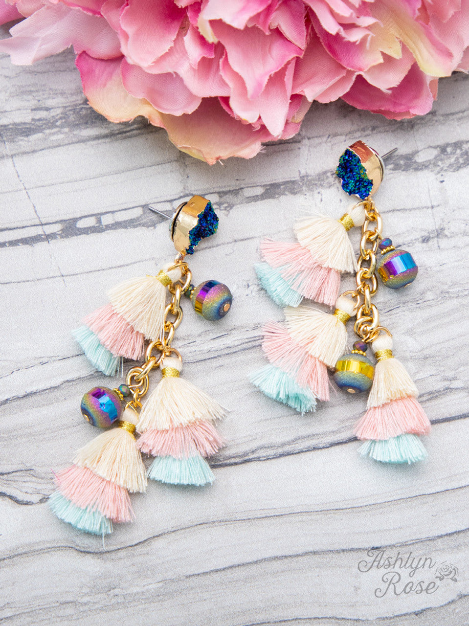 ocean-inspired tassel earrings with layered pastel fringe, iridescent beads, and deep blue-druzy style studs on gold chain drops with comfort replacement backs and gold-tone plastic disk stopper