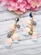 ocean-inspired tassel earrings with layered pastel fringe, iridescent beads, and deep blue-druzy style studs on gold chain drops with comfort replacement backs and gold-tone plastic disk stopper