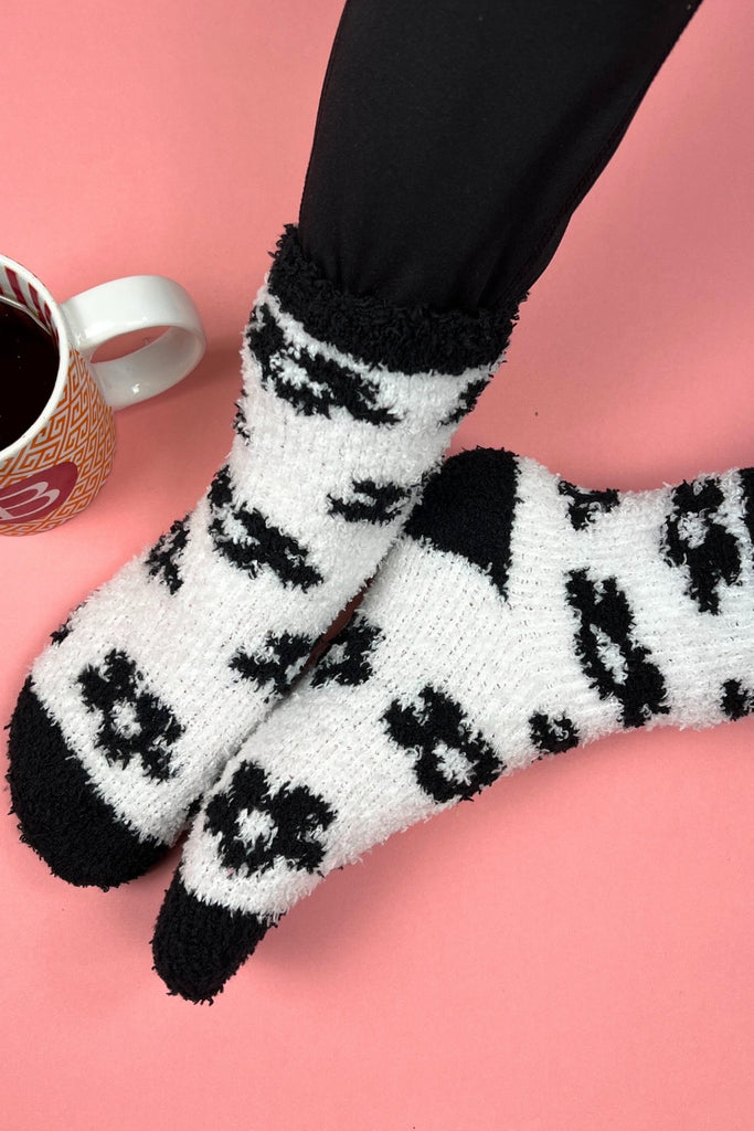 ultra soft fuzzy socks with a black floral print on white with black toe Color:&nbsp; Floral