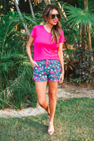 mid-rise, tie waist drawstring, side pockets, & a relaxed fit with a colorful floral pattern