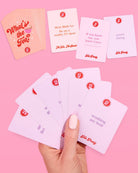 Set of cards with humorous text on a pink background