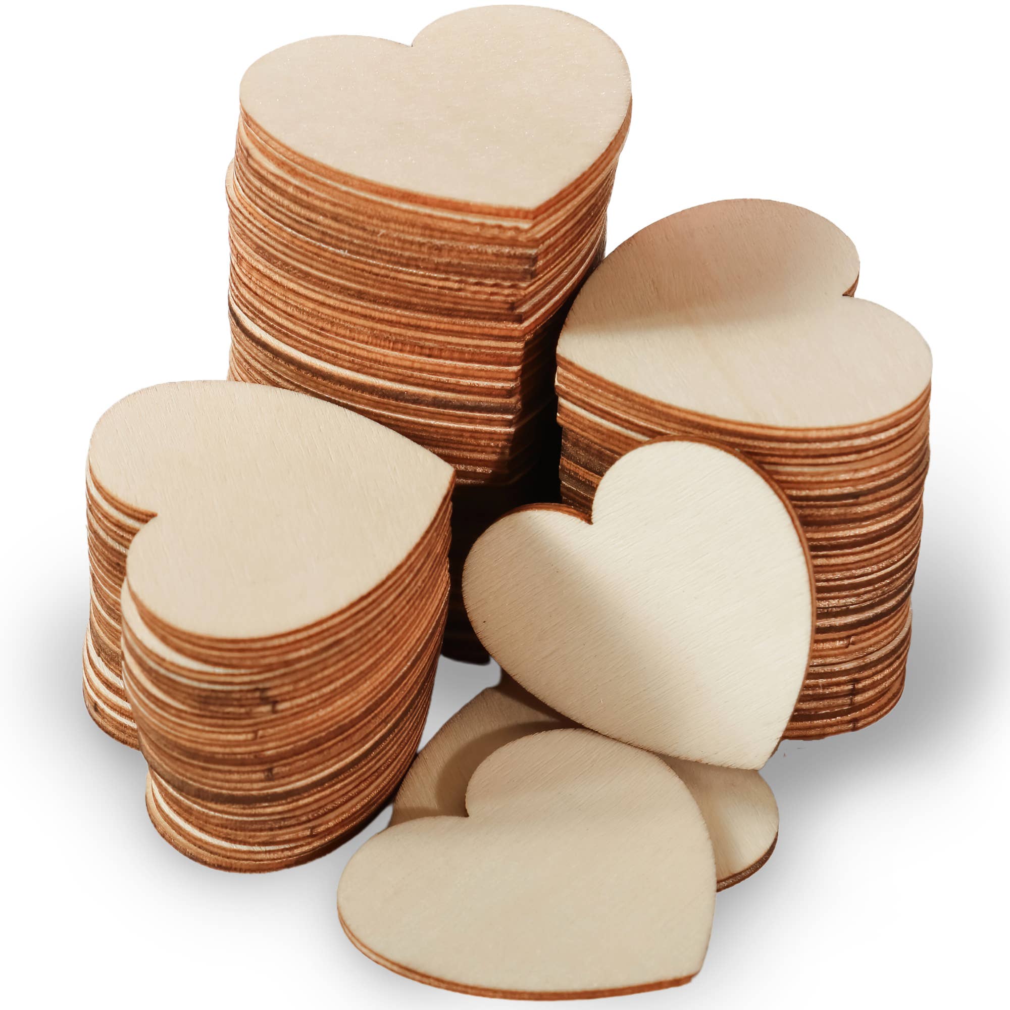 Stack of wooden heart shapes on a white background