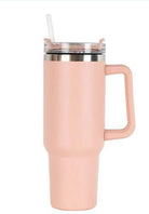 40oz double-wall insulated stainless steel tumbler with screw-on lid, sturdy handle, and reusable straw in peach