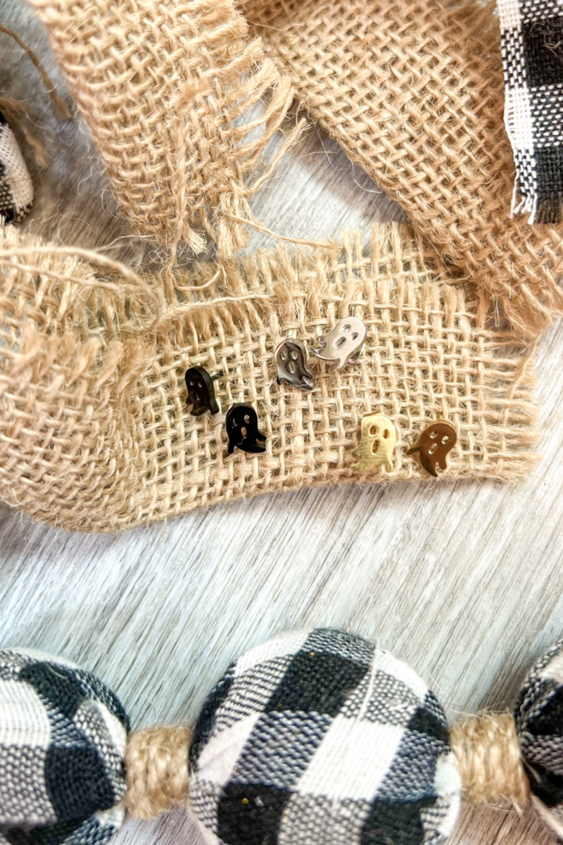 lightweight stainless steel, gold-plated post-stud earrings with shiny mirror-image ghost silhouettes, matching barrel earring backs, and nickel/lead compliant construction in black, gold, and silver