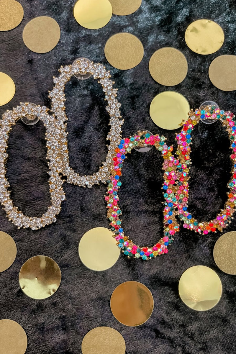 gold cubic zirconia earrings secured with a push backing in a long oval shape in crystal and multi