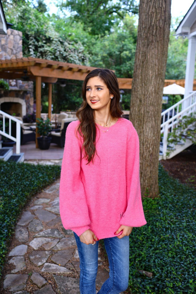 soft pink knitted sweater with balloon sleeves