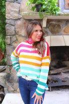 long sleeve sweater made of soft knitted material with colorful stripes