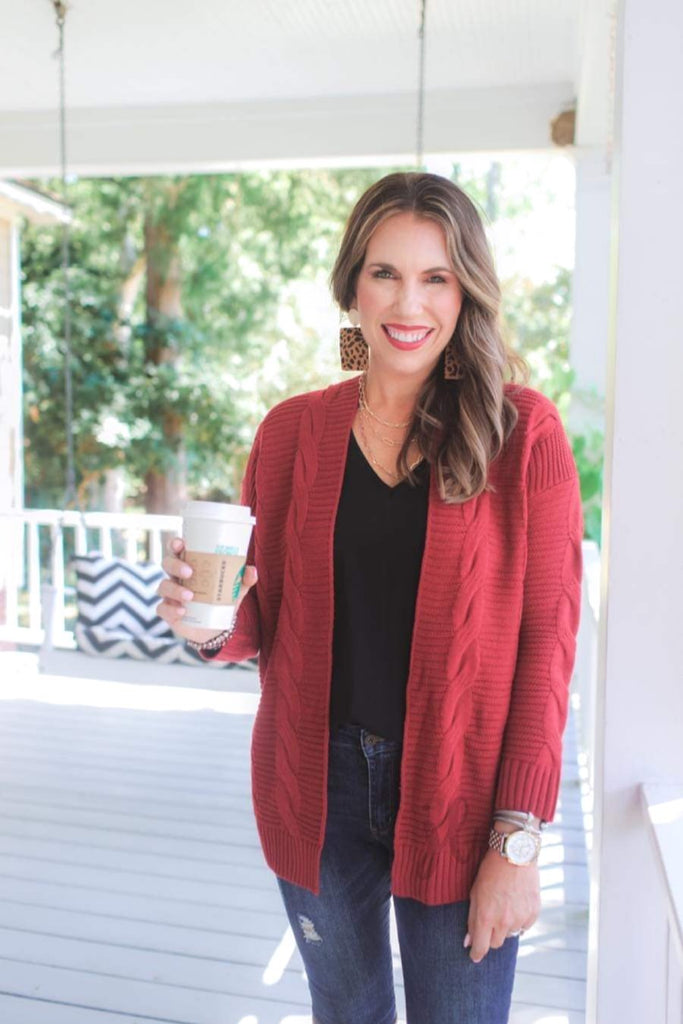 super soft and cozy cable knit fabric with an open front and relaxed fit in cranberry