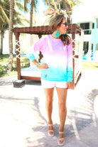 a relaxed fit, a trendy color gradient ombre design, and ribbed neckline, cuffs, and hem