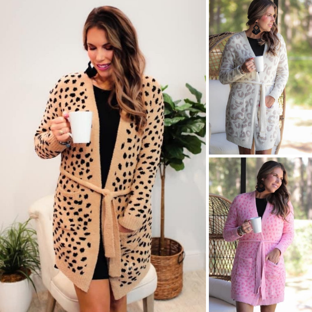 long sleeve wrap robe patterned with animal print, a straight mid-thigh length hemline, and a relaxed open front silhouette with a belt closure made of super soft material in brown spotted (left), ivory leopard (top right), and pink leopard (bottom right)