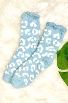 ultra-soft fuzzy socks with a playful animal print in blue