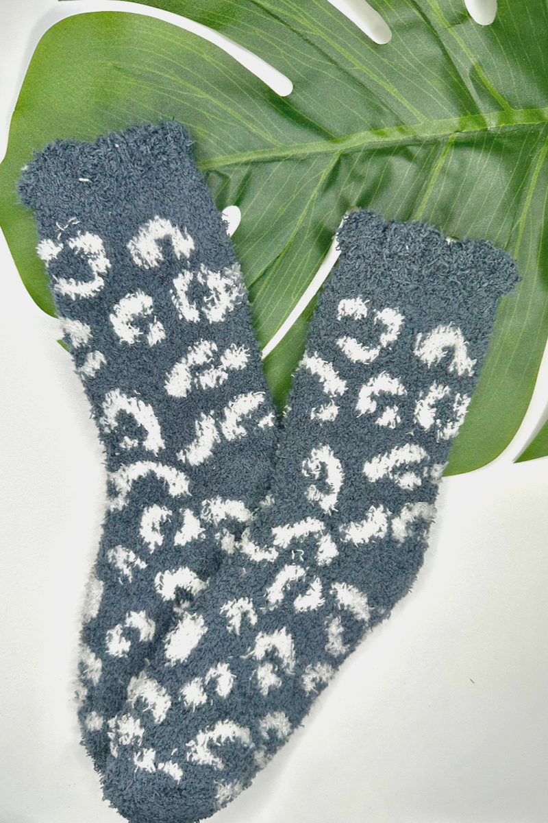 ultra-soft fuzzy socks with a playful animal print in grey