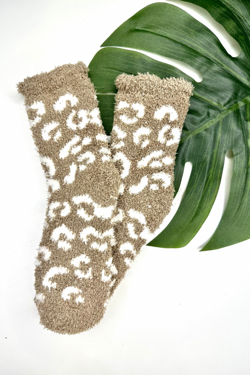 ultra-soft fuzzy socks with a playful animal print in tan