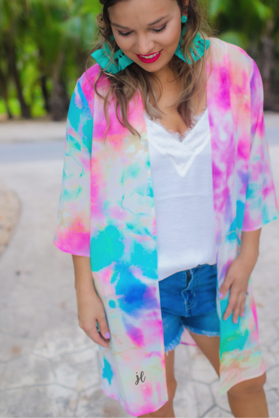 lightweight breezy material, multi-colored tie-dye print, half sleeves, and a relaxed open-front silhouette