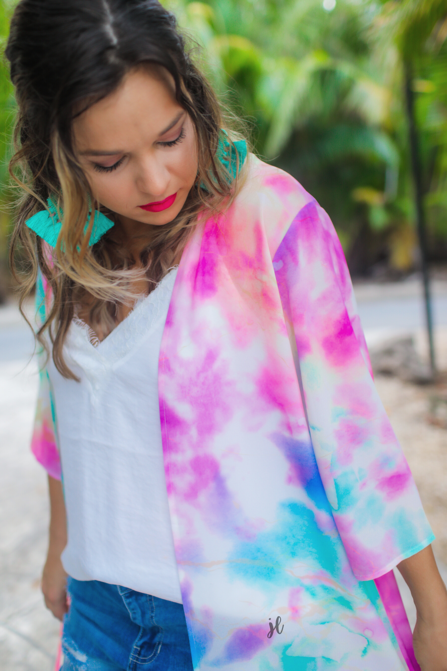 lightweight breezy material, multi-colored tie-dye print, half sleeves, and a relaxed open-front silhouette