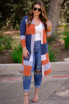 a lightweight open front color block cardigan with a slightly oversized fit, long sleeves, super soft fabric, and an easy layering silhouette on a classic print