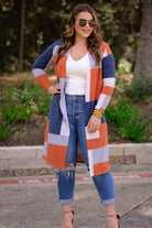 a lightweight open front color block cardigan with a slightly oversized fit, long sleeves, super soft fabric, and an easy layering silhouette on a classic print