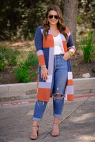 a lightweight open front color block cardigan with a slightly oversized fit, long sleeves, super soft fabric, and an easy layering silhouette on a classic print