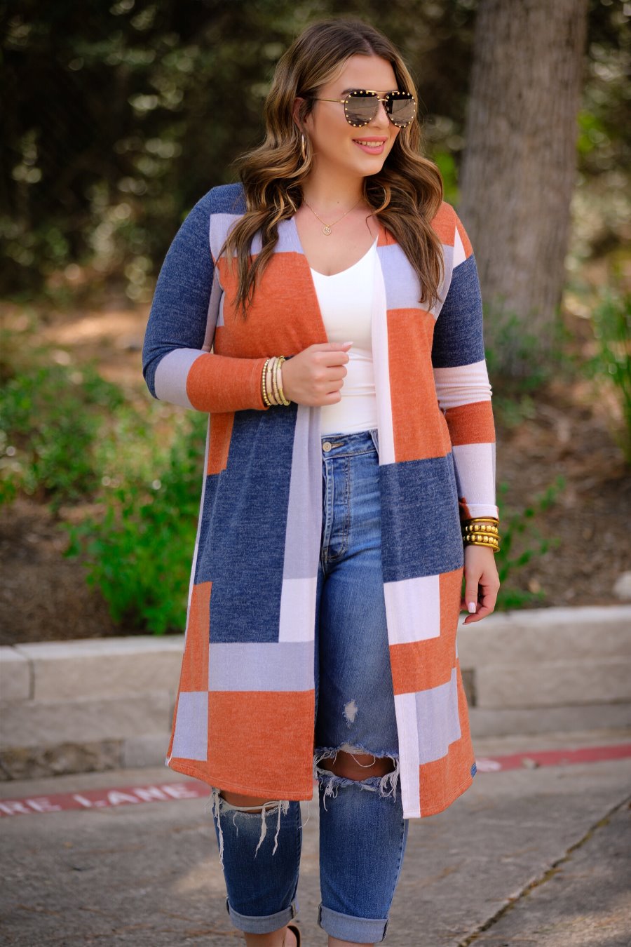 a lightweight open front color block cardigan with a slightly oversized fit, long sleeves, super soft fabric, and an easy layering silhouette on a classic print