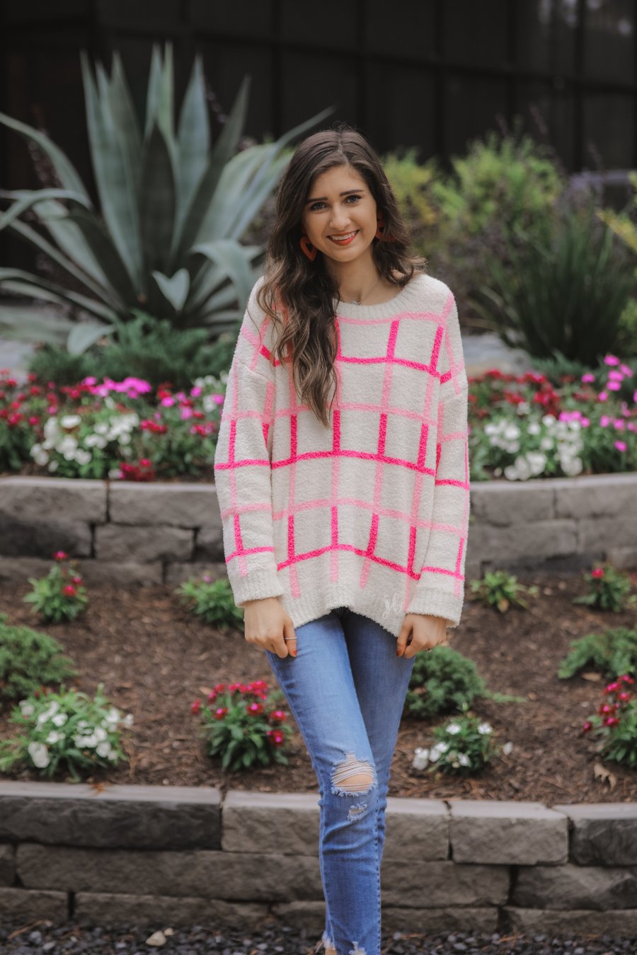 two-tone pink plaid patterned long sleeve sweater made of super soft material with a rounded neckline