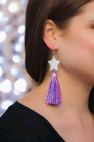 ultra-lightweight hook-style drop earring with a white star topper cascading down into a soft red, white, and blue tassel mix and gold accent