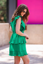 ruffled sleeve dress with layered pleats, an elastic waistband, and a lined bottom in green