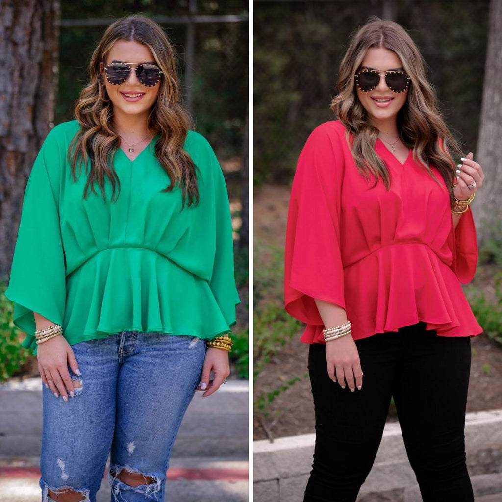 dolman long sleeves top with a plunging v-neckline and a gathered waistline in green and red