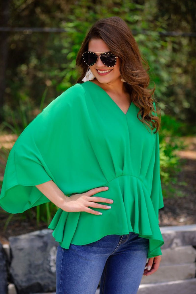 dolman long sleeves top with a plunging v-neckline and a gathered waistline in green